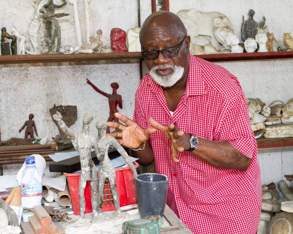 Alfred liyolo working in his workshop in kinshasa
