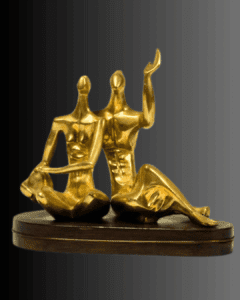 A statue showing two figures male and female by Alfred Liyolo j1980
